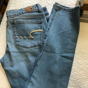 American Eagle, light wash skinny jeans.
